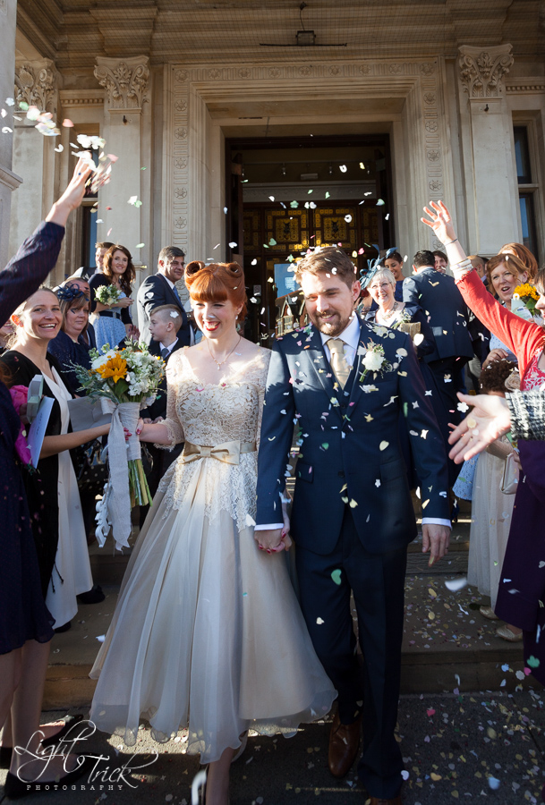 Throwing confetti at Eastbourne town hall entrance