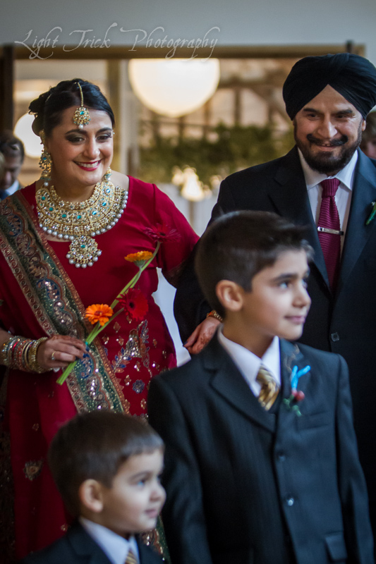 Indian bride arriving with father