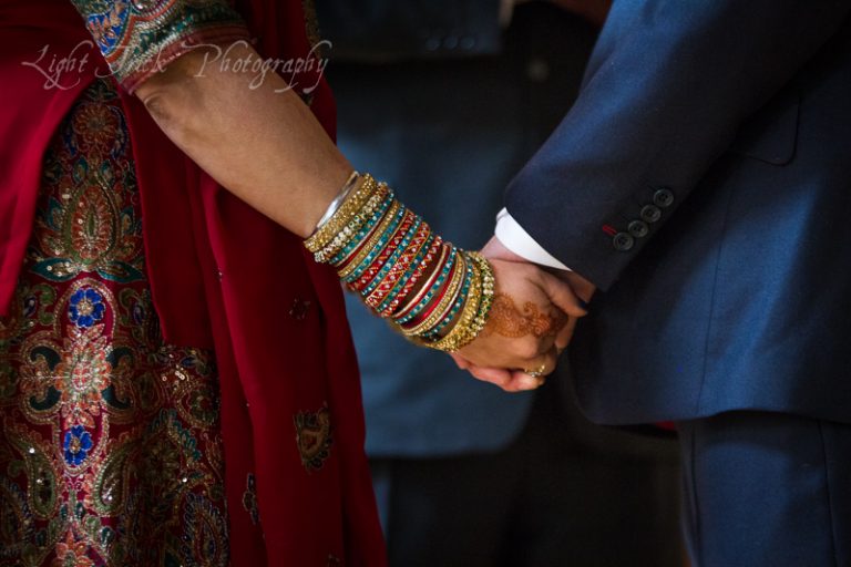wedding couple holding hands